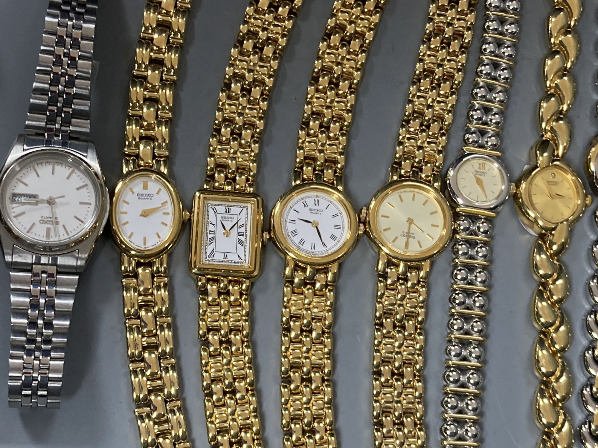 Three lady's 9ct gold wrist watches including two quartz, gross 29.9 grams and sixteen assorted lady's modern Seiko wrist watches.